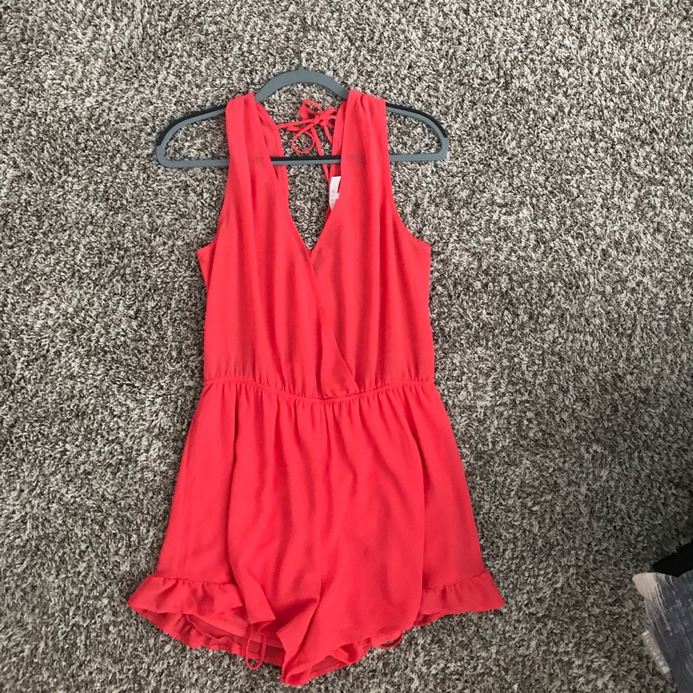 ASTR romper! Fun and bright color for summer!